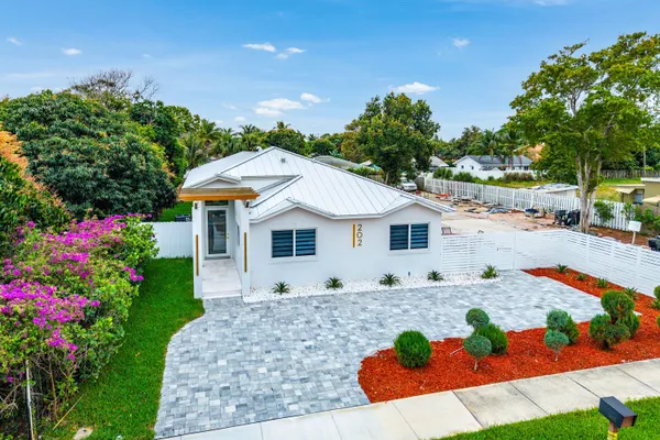 a view of house with outdoor space