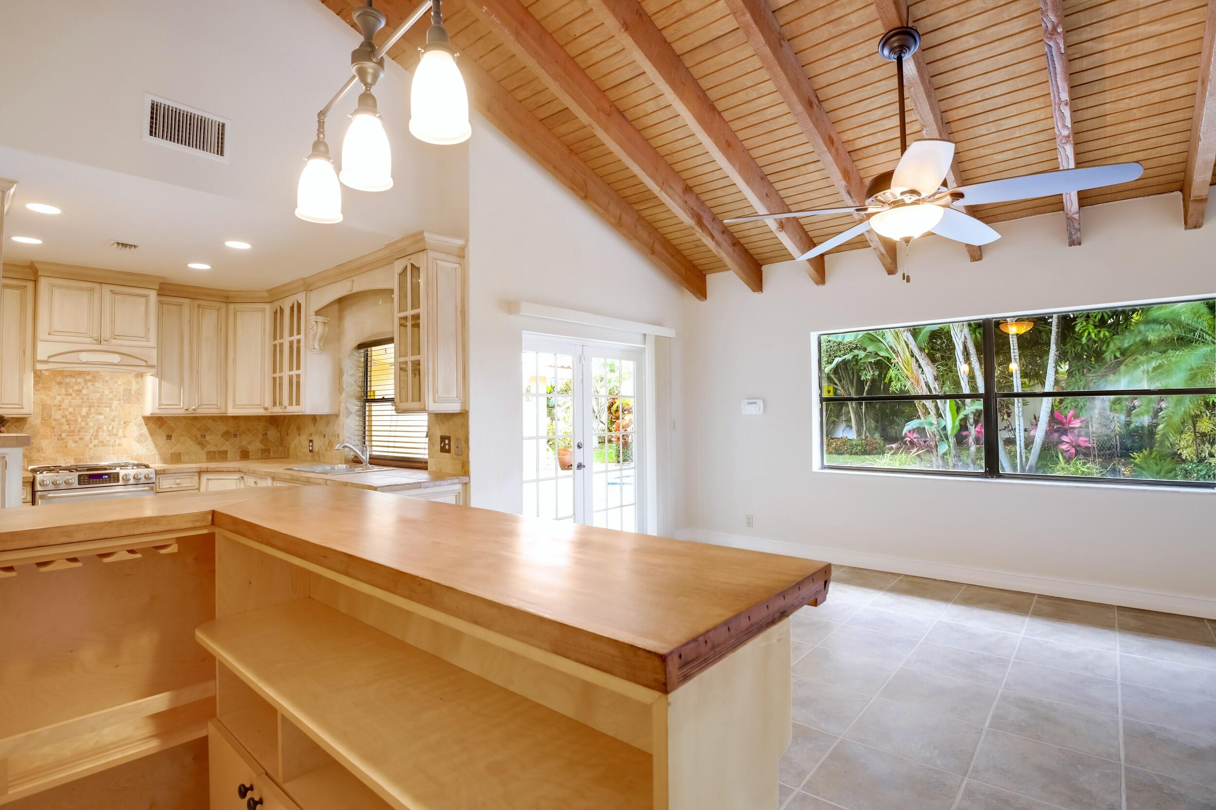 21243 Escondido Way North Boca Raton, FL 33433 - Photo 15 of 42 Family room solid maple bar