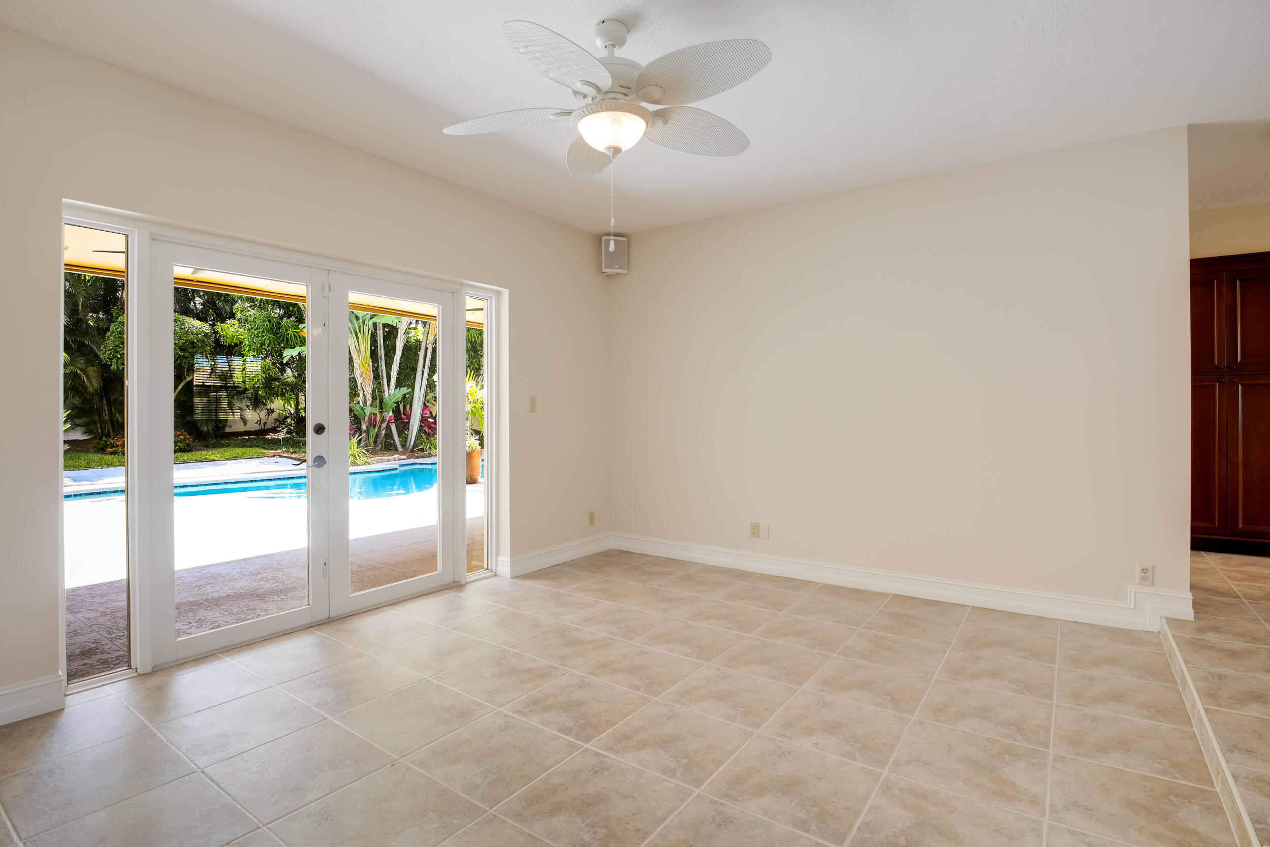 21243 Escondido Way North Boca Raton, FL 33433 - Photo 22 of 42 Living room w/view of pool/garden