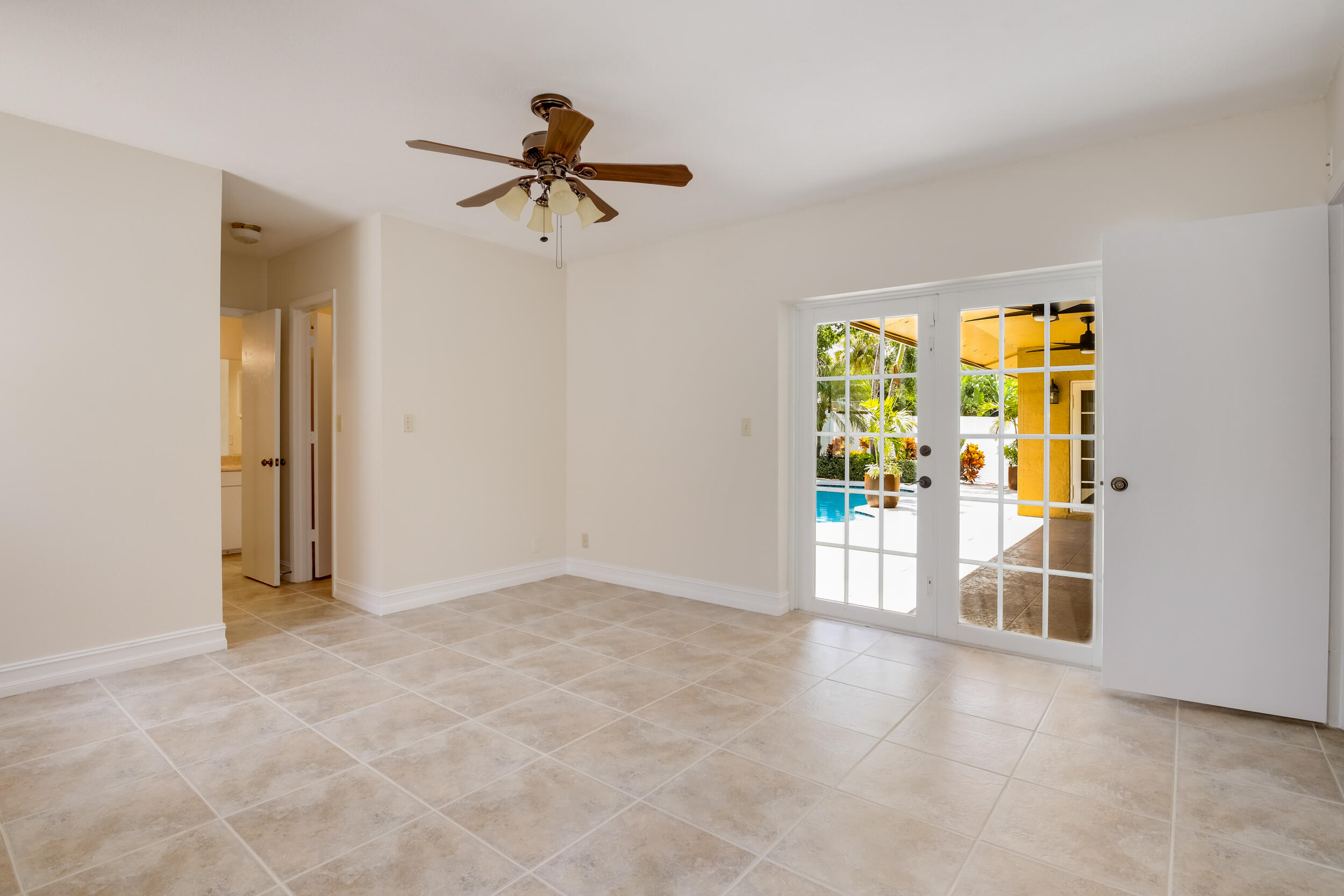 21243 Escondido Way North Boca Raton, FL 33433 - Photo 26 of 42 Primary bedroom w/French doors to patio