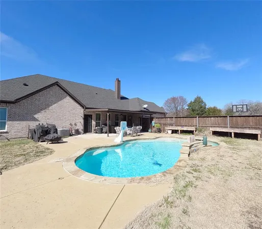 a view of a house with swimming pool
