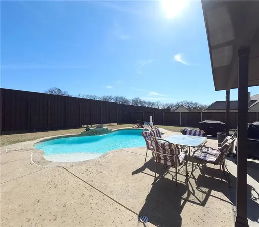 a front view of a house with swimming pool