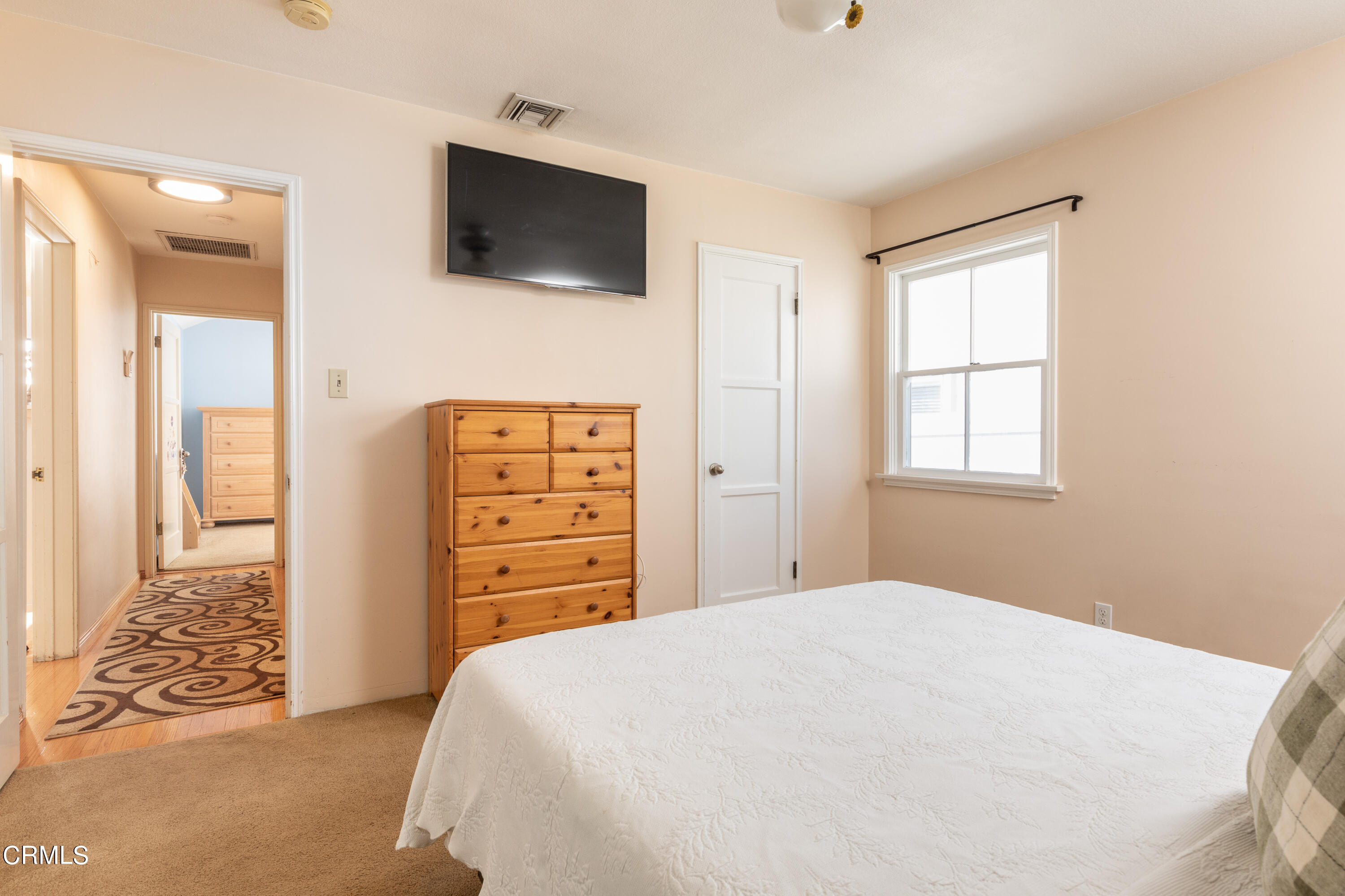 1539 Broadview Drive Glendale, CA 91208 - Photo 13 of 19 a bedroom with a bed and a flat screen tv