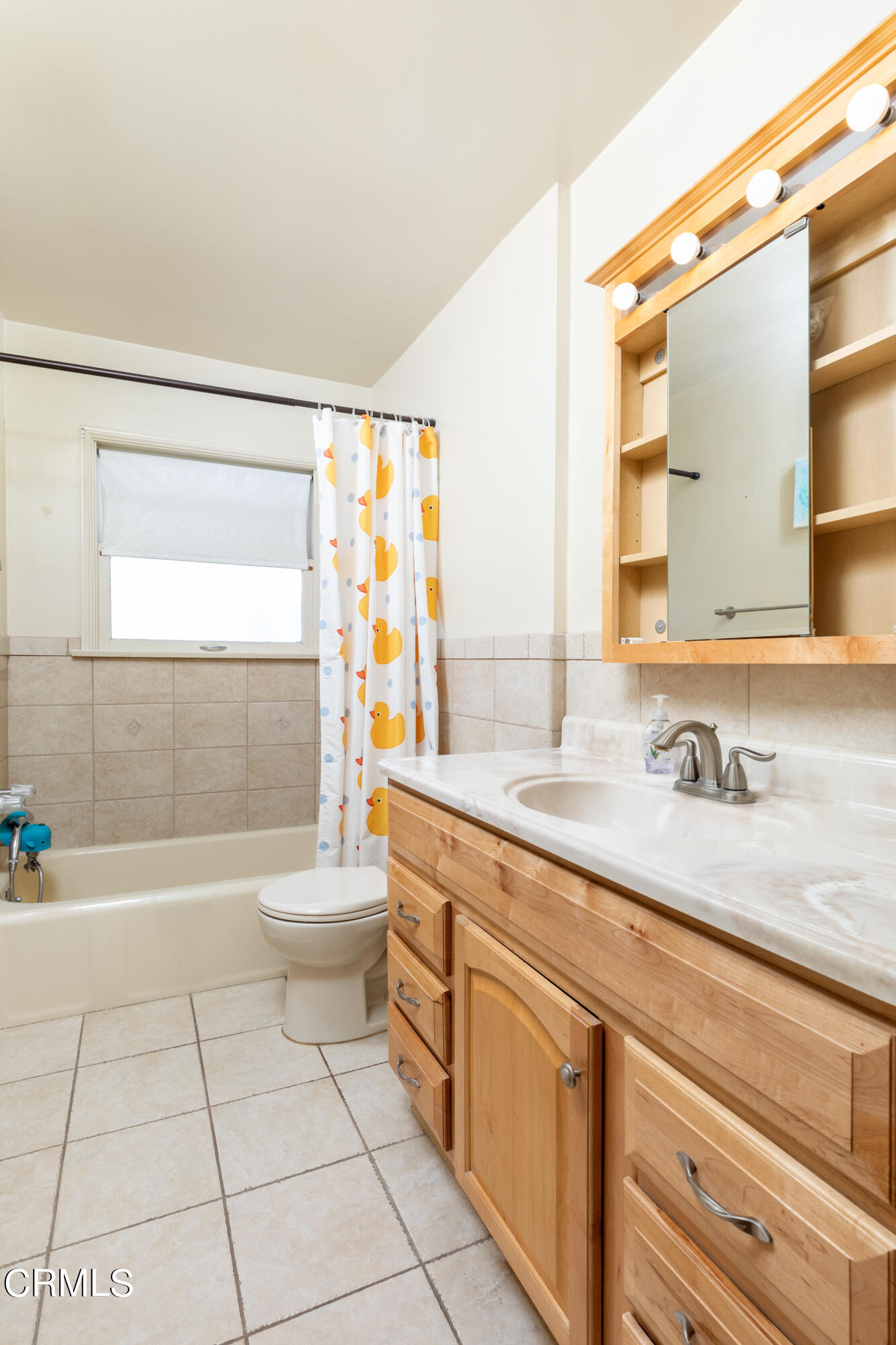 1539 Broadview Drive Glendale, CA 91208 - Photo 14 of 19 a bathroom with a granite countertop sink a toilet a mirror and bathtub