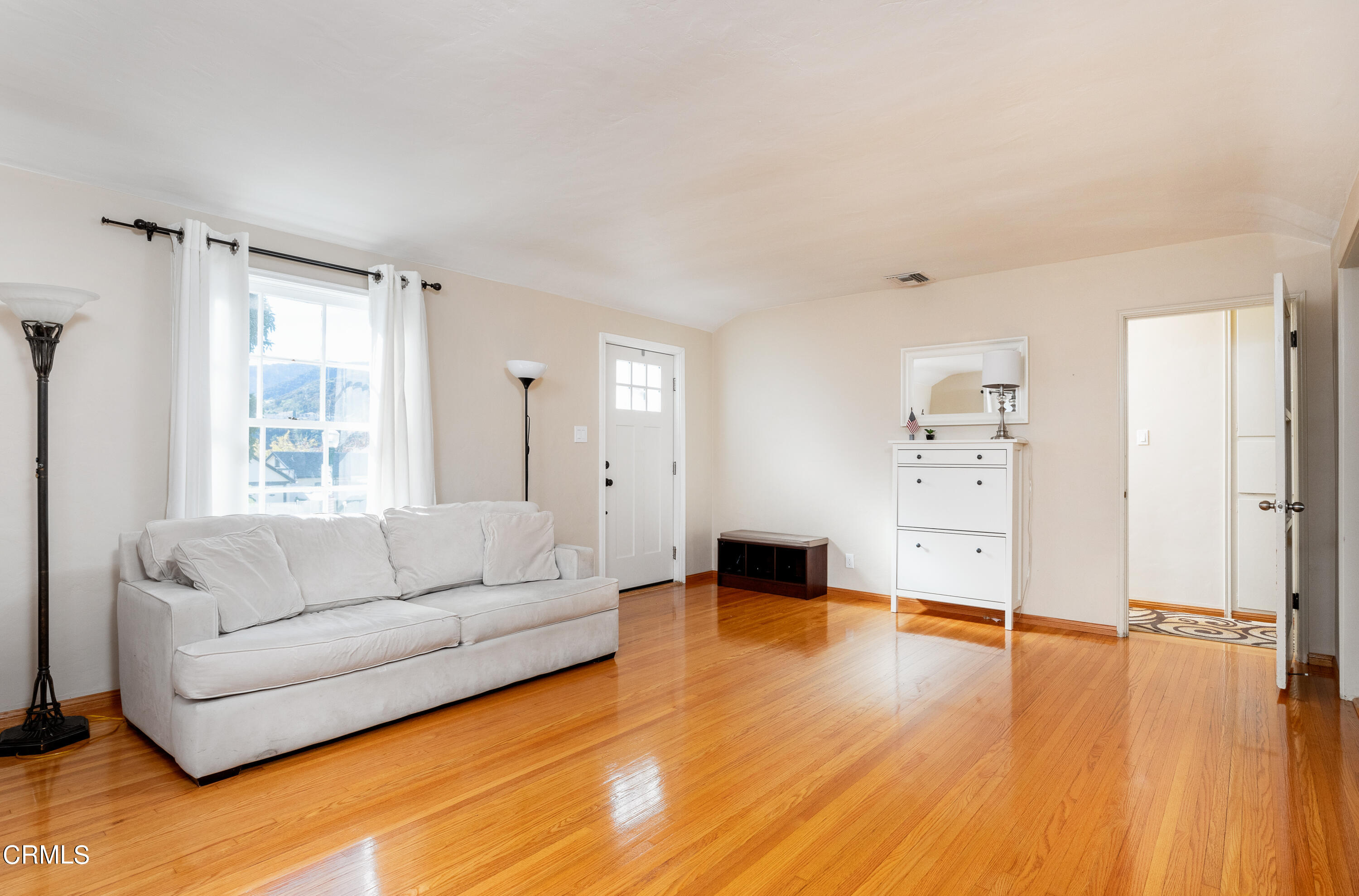 1539 Broadview Drive Glendale, CA 91208 - Photo 2 of 19 a living room with furniture and a large window
