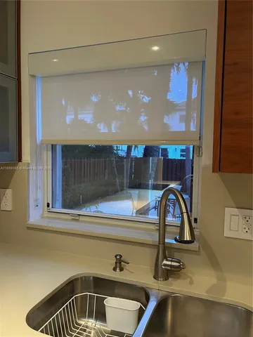 a view of entryway with a door