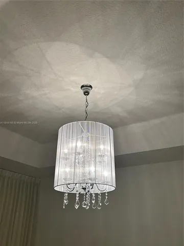 a view of room with closet and racks