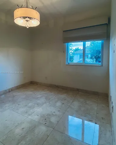 a bathroom with a sink and a shower