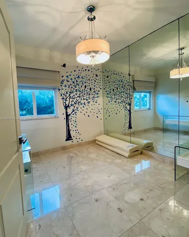 a view of a backyard and a patio