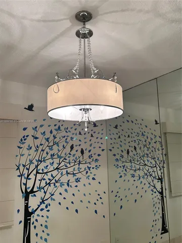 a view of outdoor kitchen with seating area and furniture