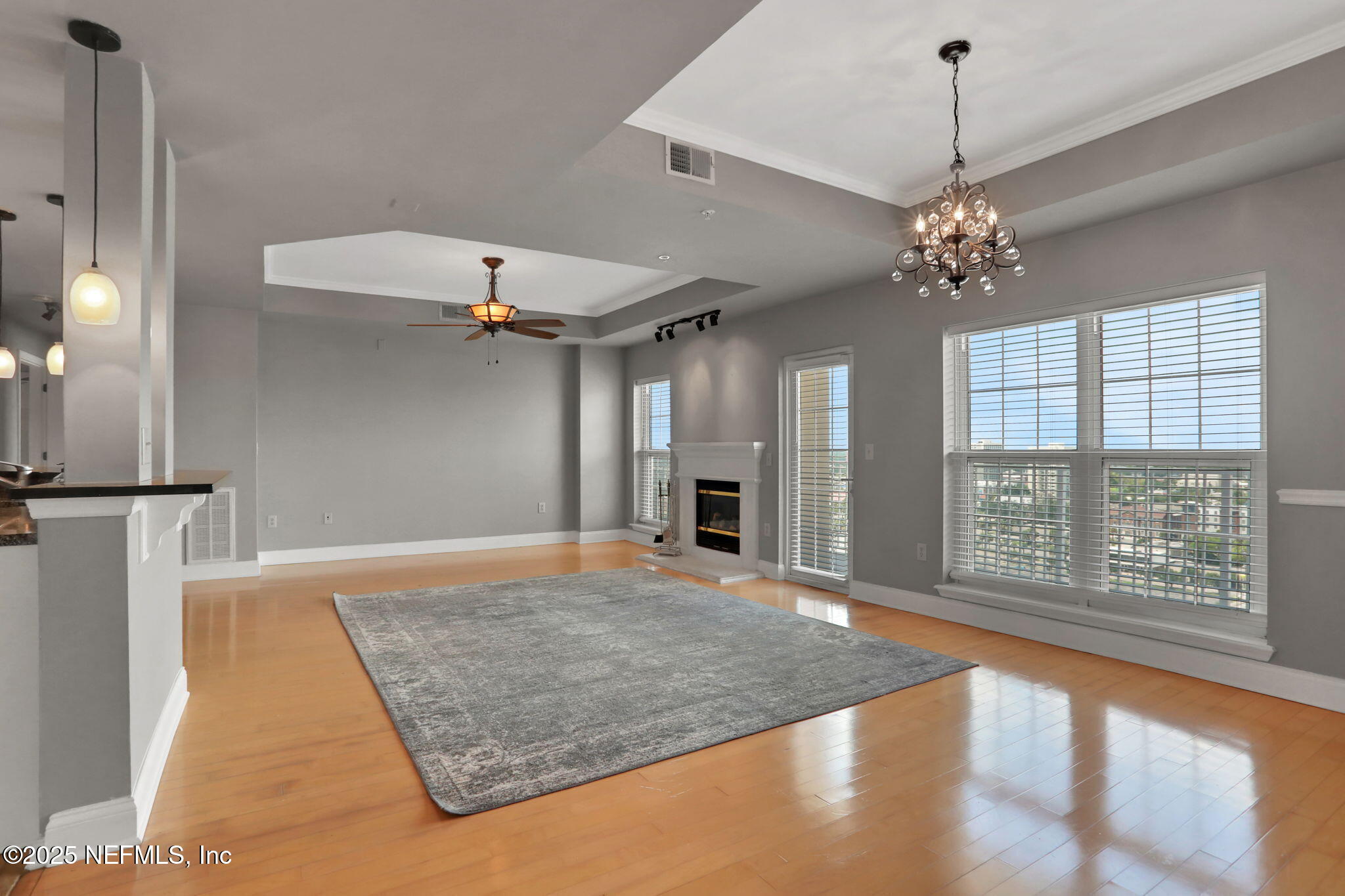 400 East Bay Street, Unit 1705 Jacksonville, FL 32202 - Photo 17 of 68 a view of an empty room with a chandelier
