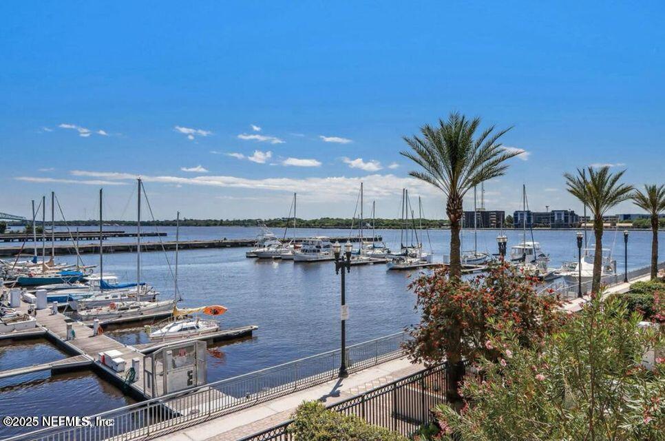 400 East Bay Street, Unit 1705 Jacksonville, FL 32202 - Photo 3 of 68 a living room with furniture a pool table and potted plants