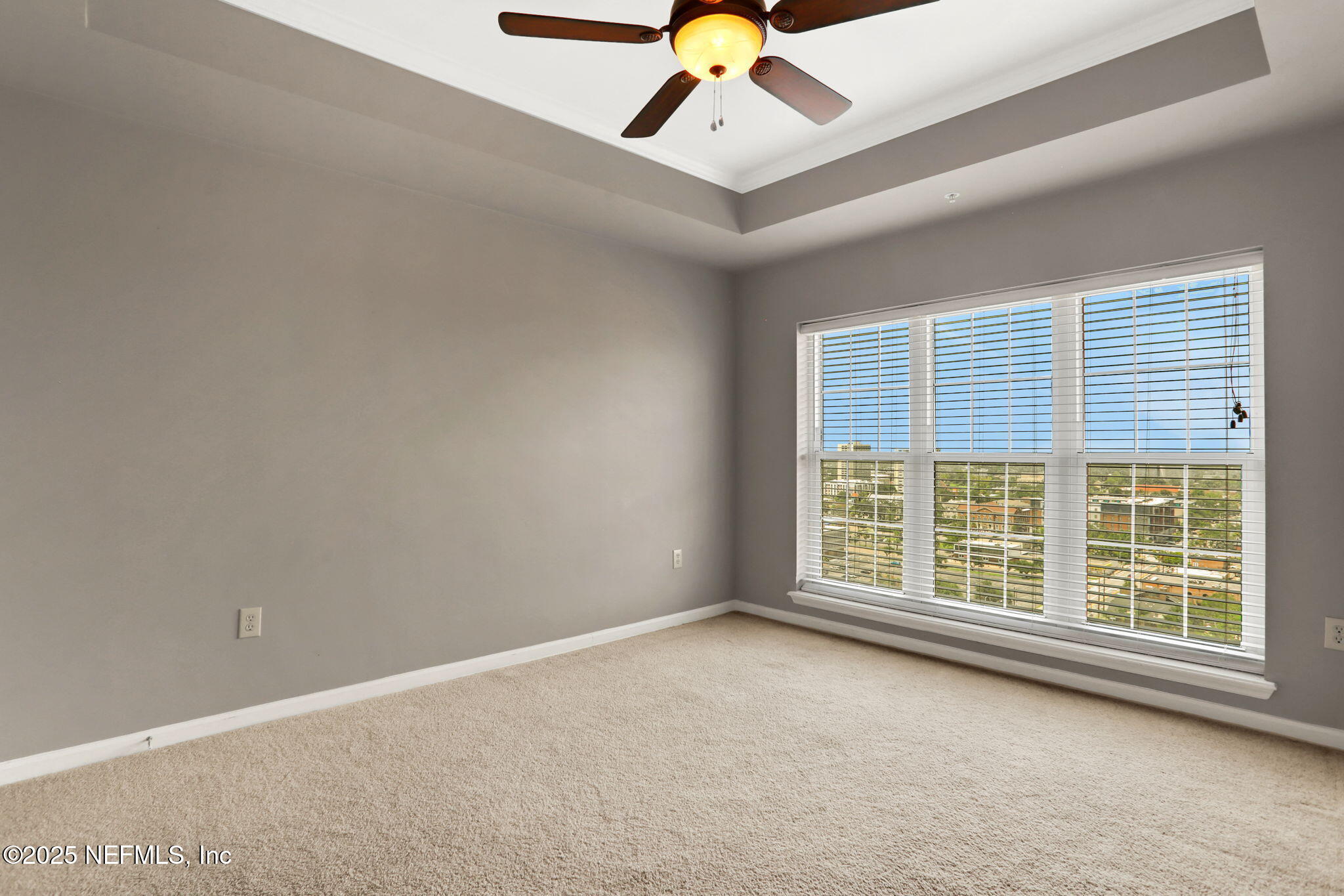 400 East Bay Street, Unit 1705 Jacksonville, FL 32202 - Photo 31 of 68 an empty room with windows