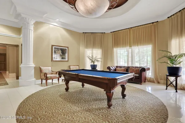 a stove top oven sitting inside of a kitchen