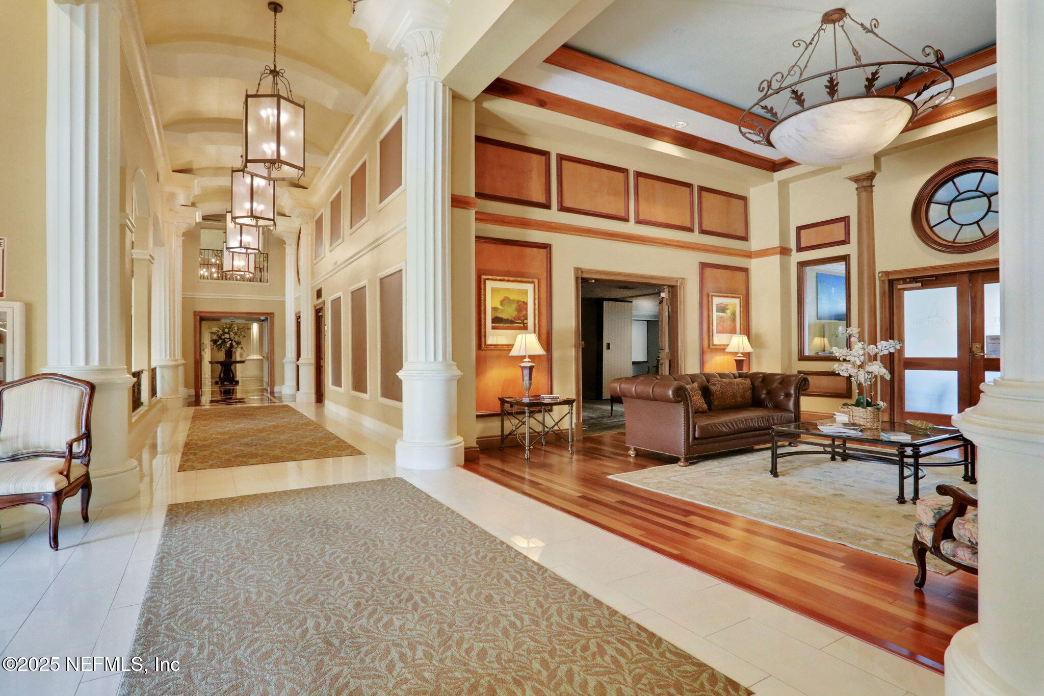 400 East Bay Street, Unit 1705 Jacksonville, FL 32202 - Photo 7 of 68 a living room with fireplace furniture and a large window
