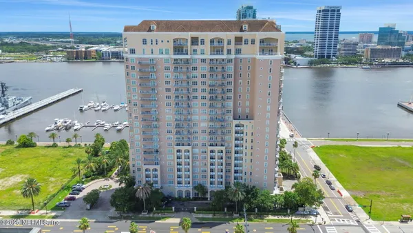 a kitchen with a sink and a stove top oven