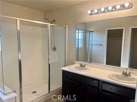 a bathroom with a bathtub and shower