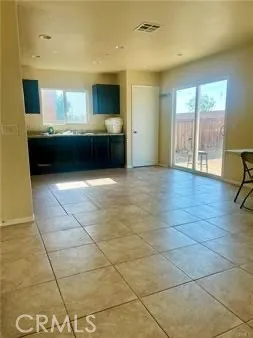 a large bathroom with a sink and a large mirror