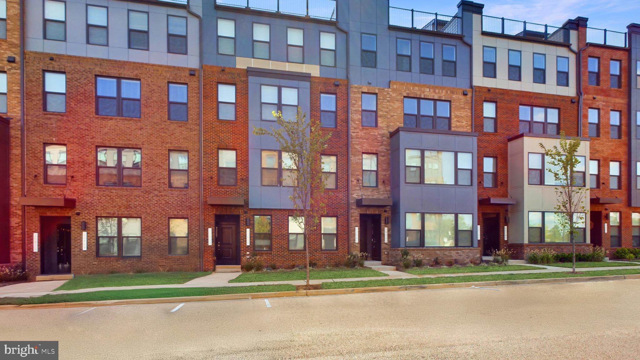 43801 Middleway Terrace Ashburn, VA 20147 - Photo 2 of 54 a city view of a multi story building