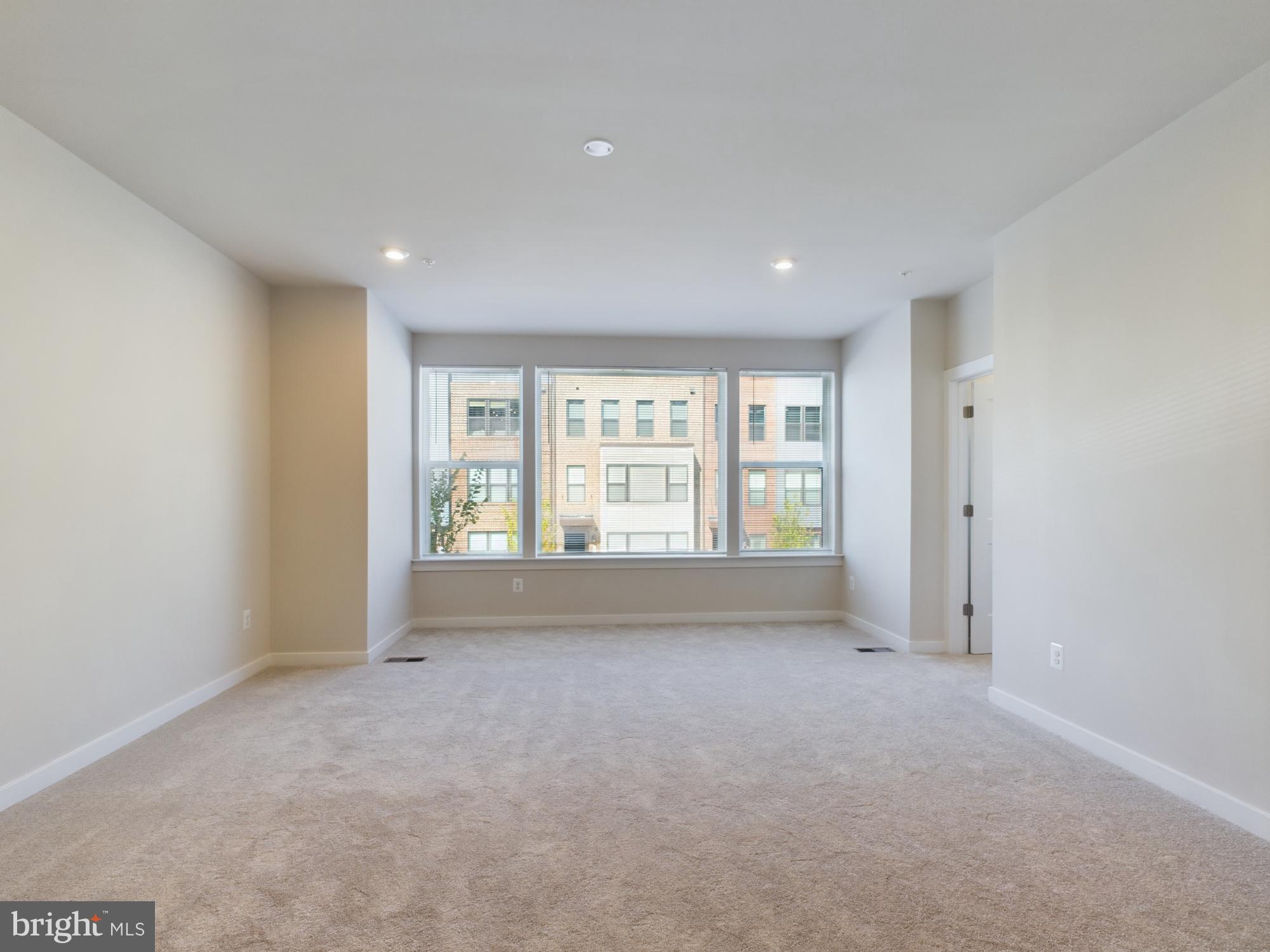 43801 Middleway Terrace Ashburn, VA 20147 - Photo 24 of 54 a view of an empty room with a window