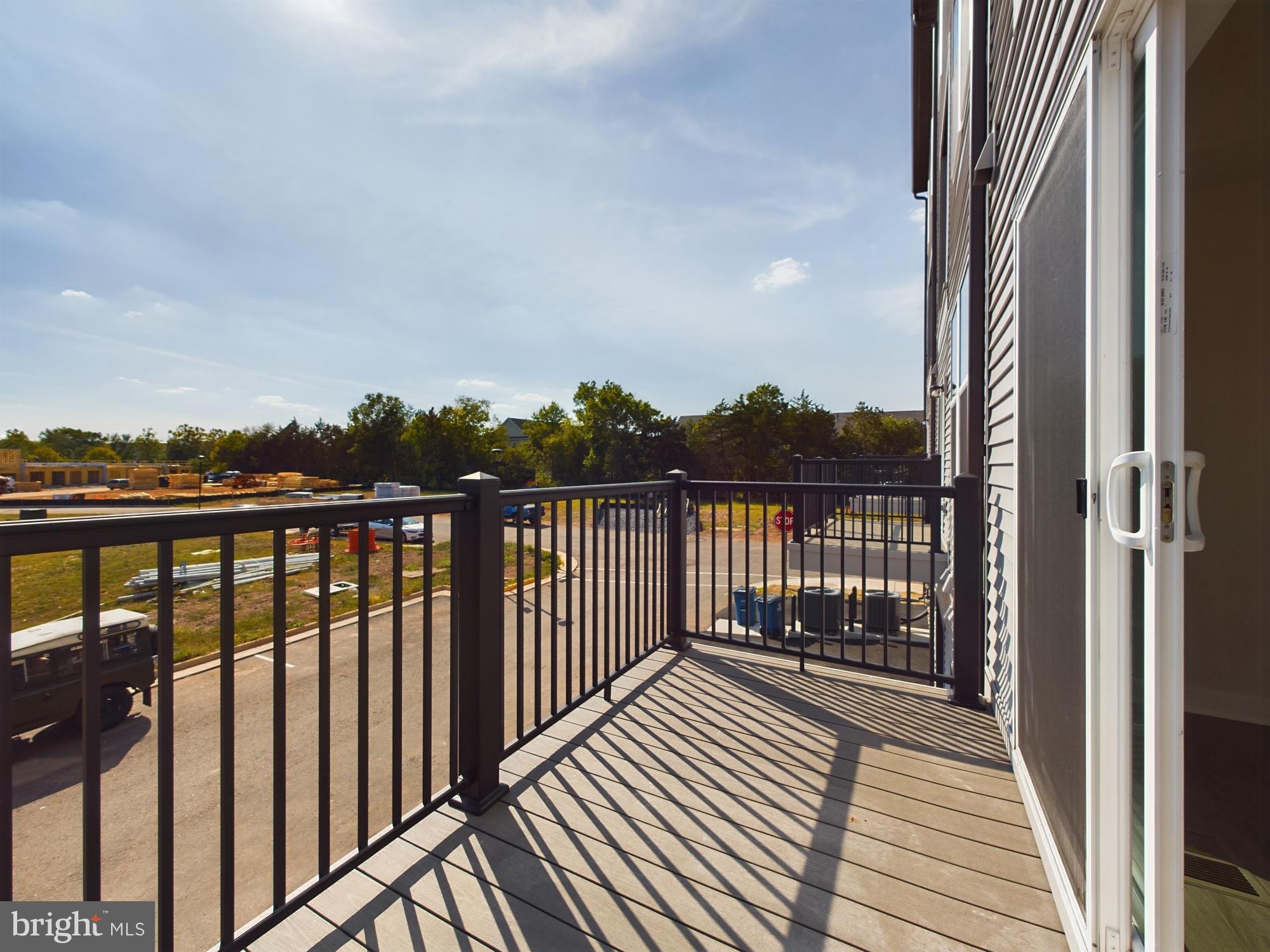43801 Middleway Terrace Ashburn, VA 20147 - Photo 49 of 54 a view of balcony with wooden floor