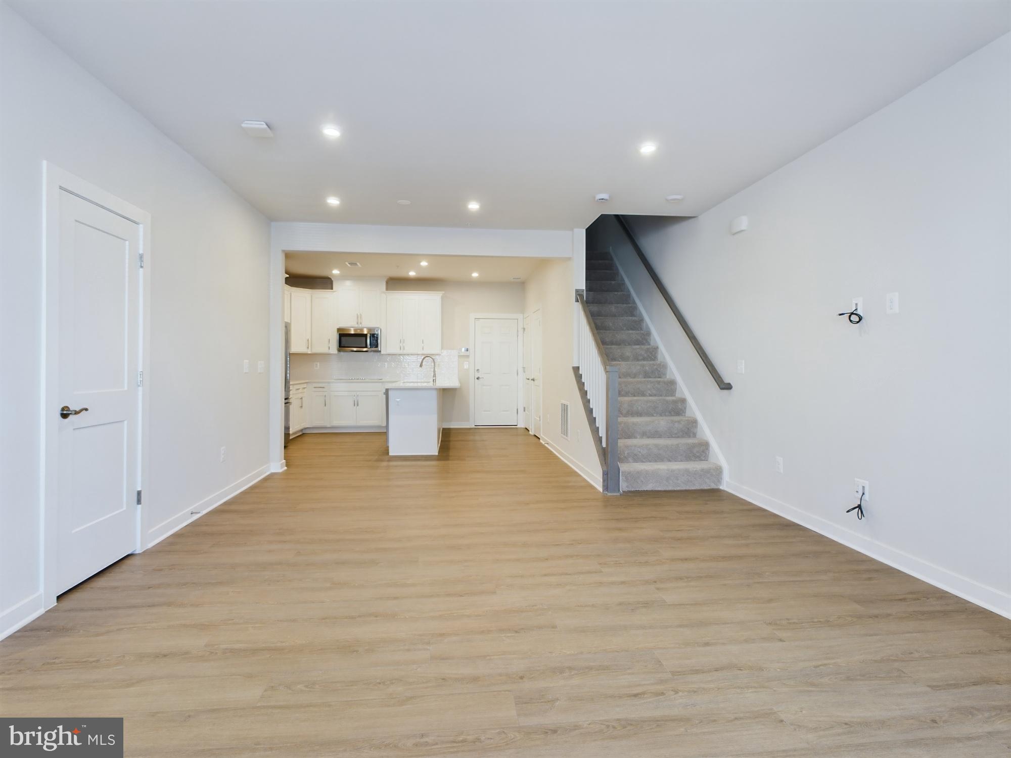 43801 Middleway Terrace Ashburn, VA 20147 - Photo 6 of 54 a view of empty room with wooden floor