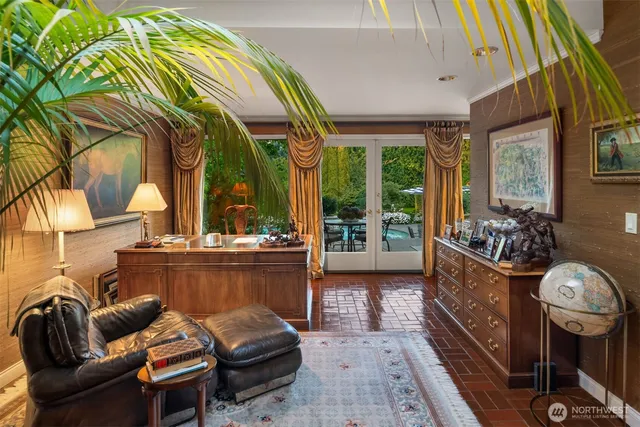 a room with furniture and a large window