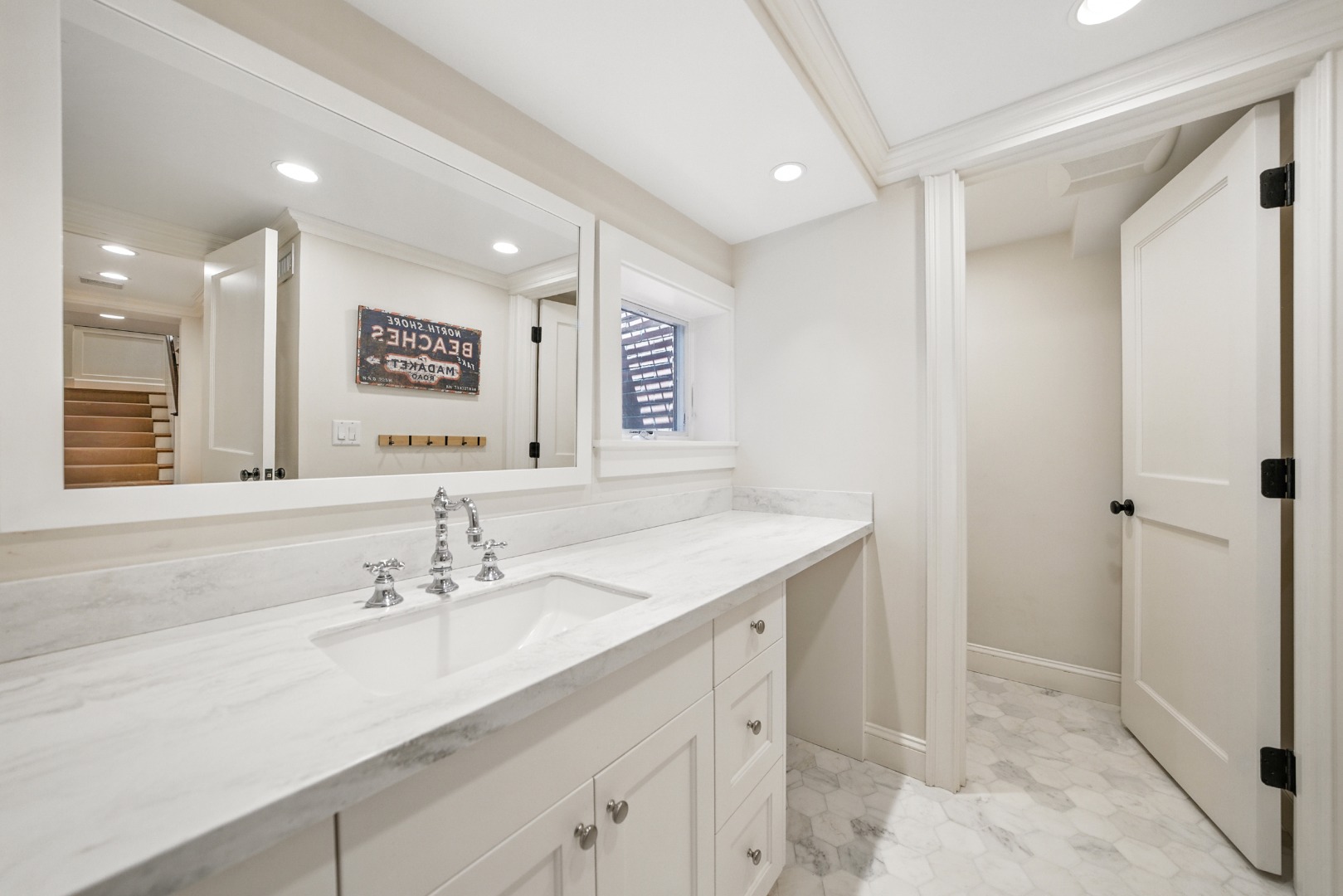18 Mill Street Nantucket, MA 02554 - Photo 30 of 47 a bathroom with a sink and a mirror