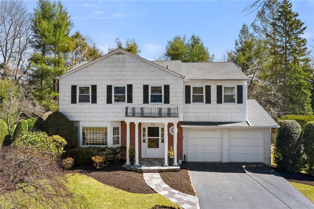 53 Country Ridge Circle Rye Brook, NY 10573 - Photo 1 of 1 a front view of a house with a yard