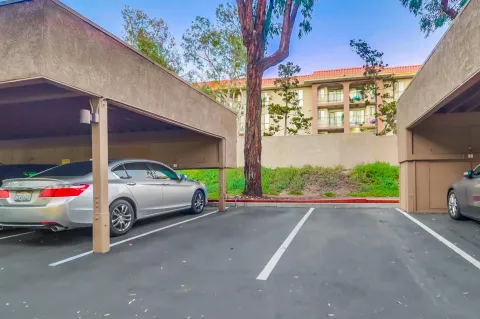 a view of street with parked cars