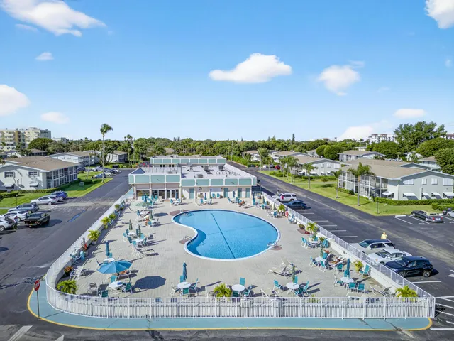 a view of a swimming pool with a terrace