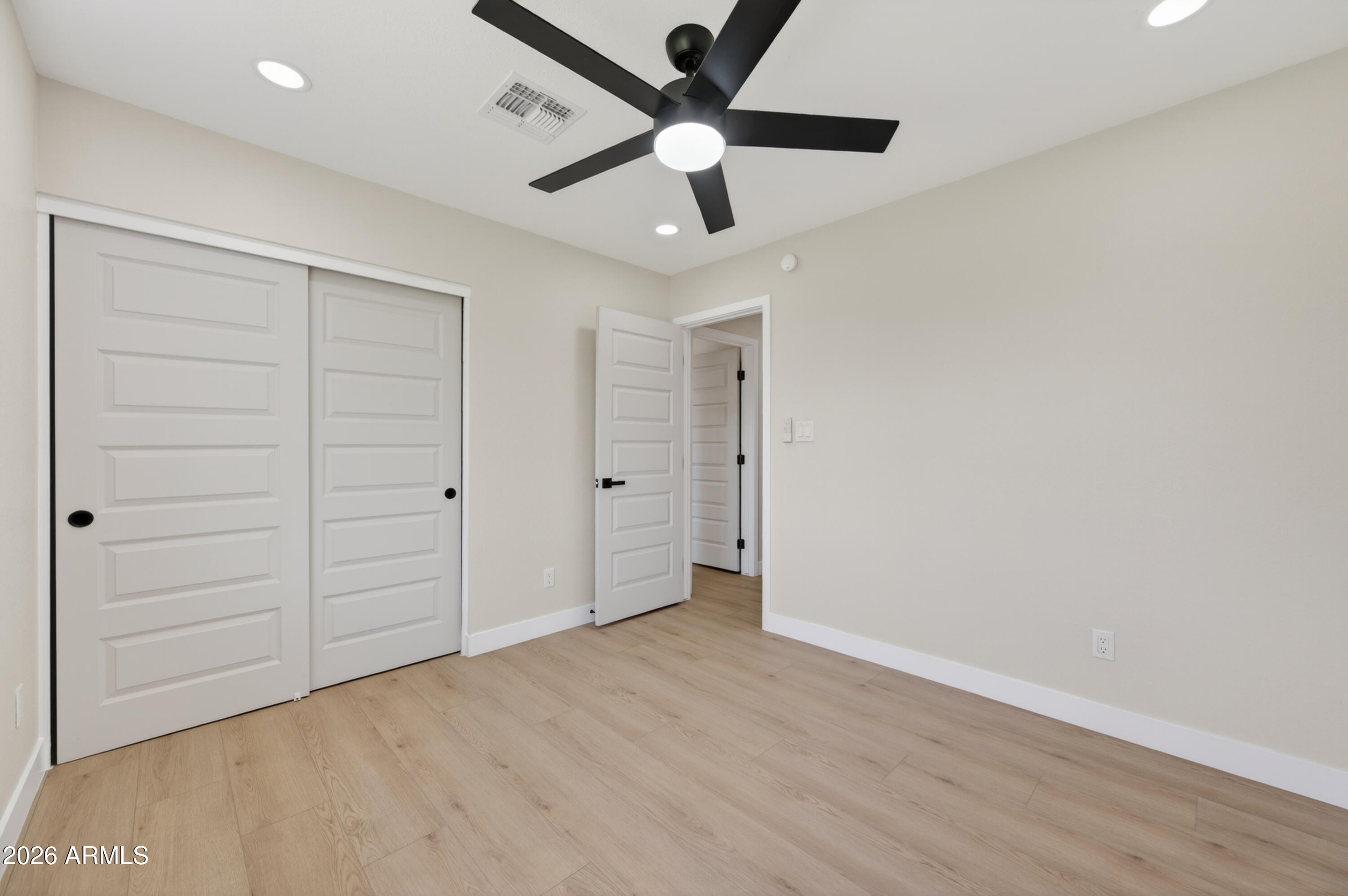 3422 South Terrace Road Tempe, AZ 85282 - Photo 26 of 43 wooden floor in an empty room