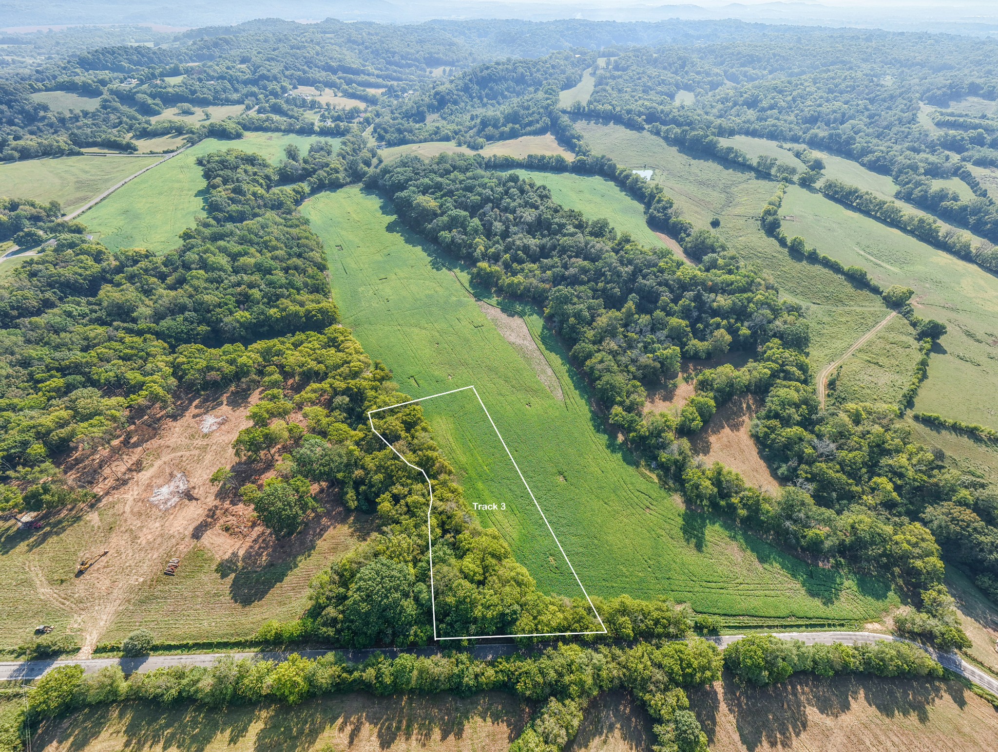 3 Craig Bridge Road Williamsport, TN 38487 - Photo 1 of 7 an aerial view of mountain with residential house and ocean view