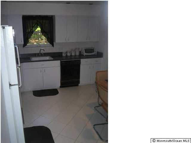 126 Hope Chapel Road Jackson, NJ 08527 - Photo 3 of 3 a kitchen with a sink and cabinets