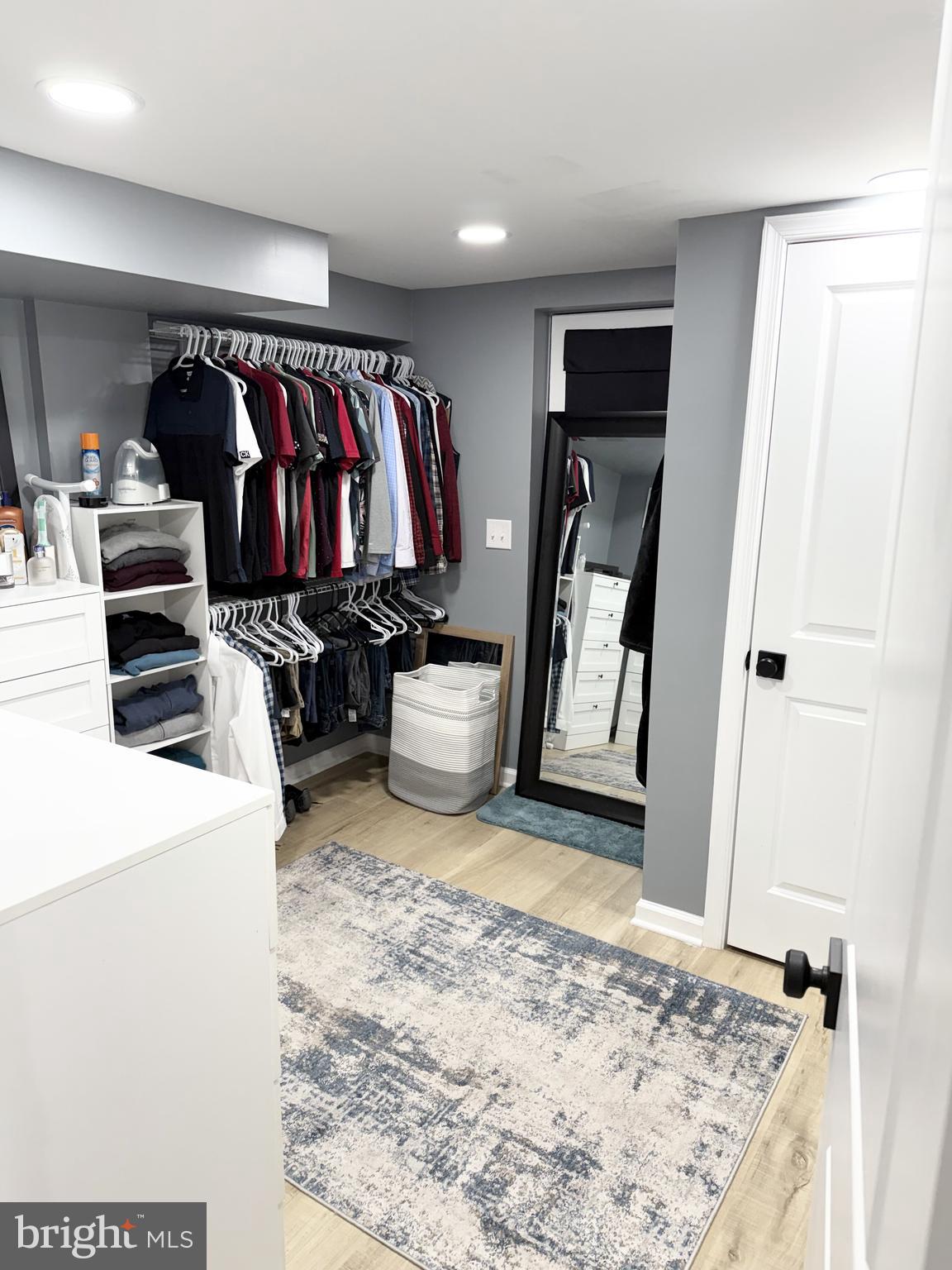 161 Elmira Street Southwest Washington, DC 20032 - Photo 18 of 23 a view of walk in closet with clothes and shoes