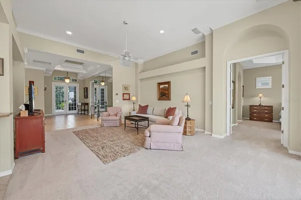 a living room with furniture and a table