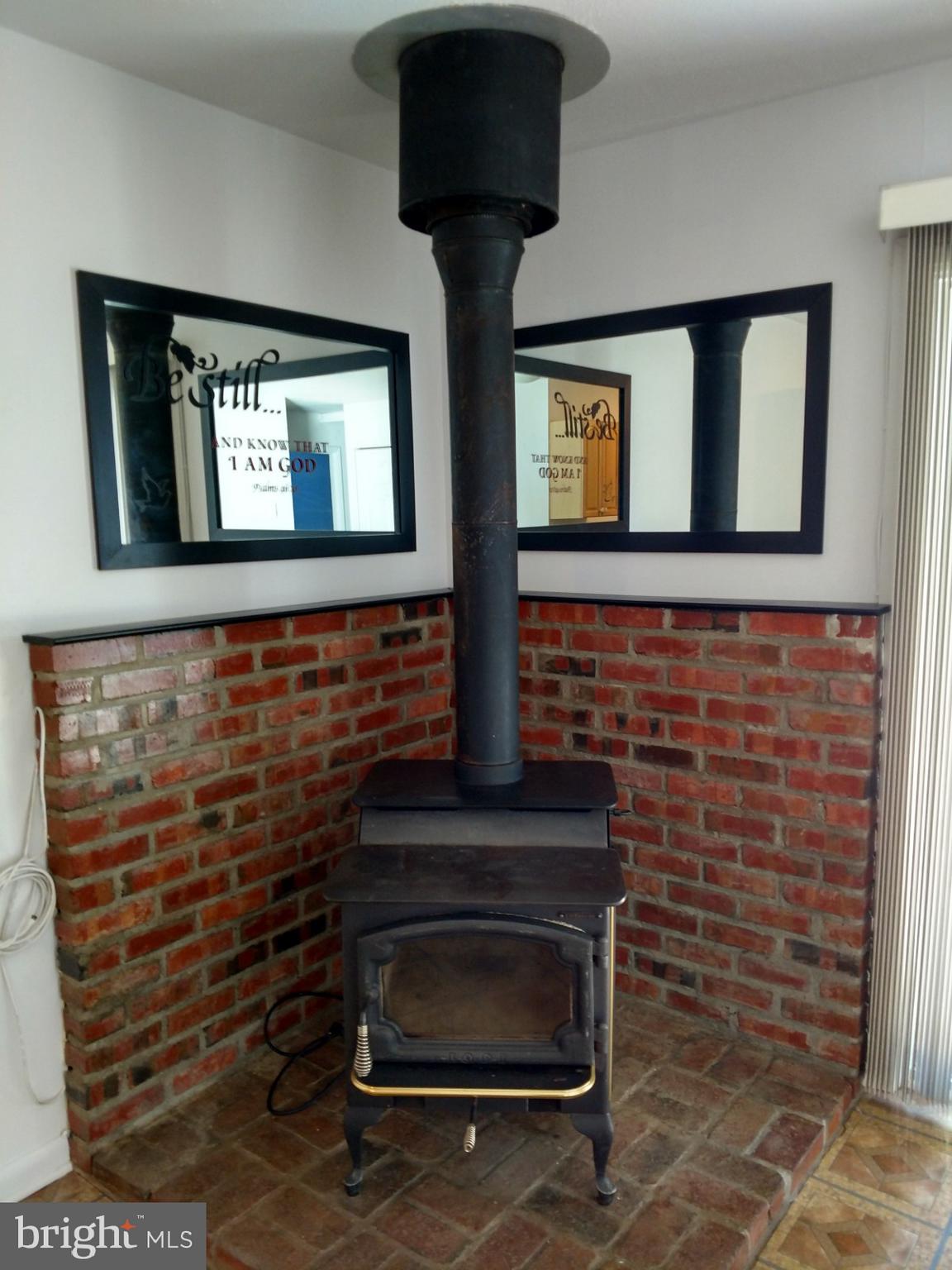 115 Haverhill Road Joppa, MD 21085 - Photo 15 of 35 Warm wood stove can heat the entire house!