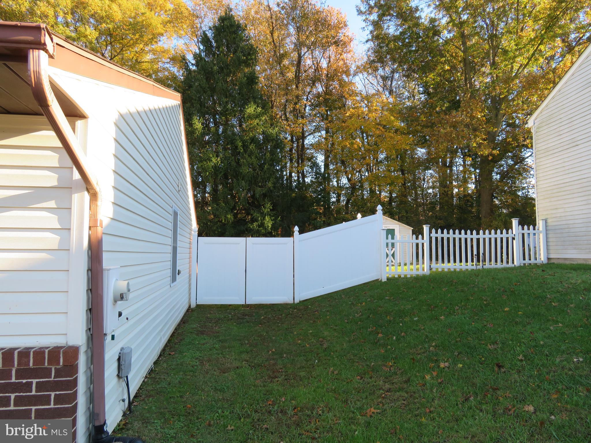 115 Haverhill Road Joppa, MD 21085 - Photo 32 of 35 Privacey fence across the front and down both side
