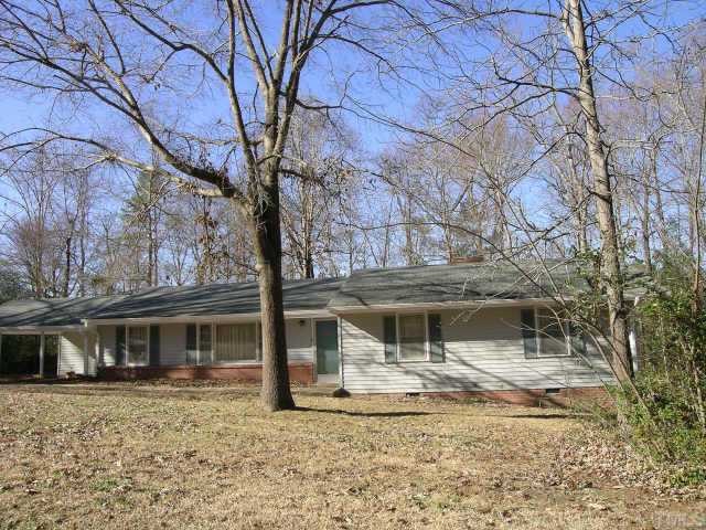 2423 Andor Place Raleigh, NC 27604 - Photo 2 of 6 a front view of a house with a yard