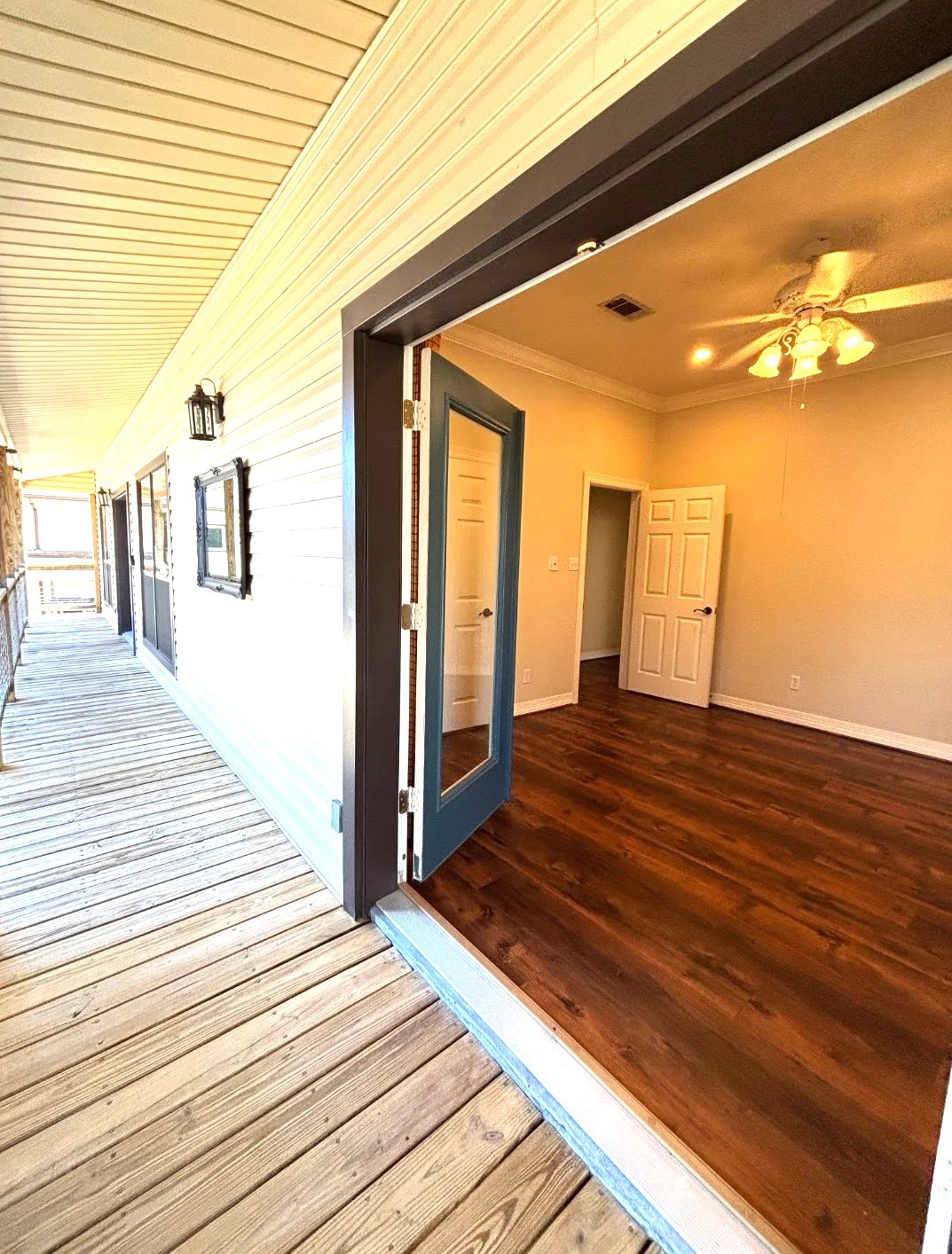 318 Ridgewood Road Goodrich, TX 77335 - Photo 18 of 49 a view of a balcony with wooden floor and staircase
