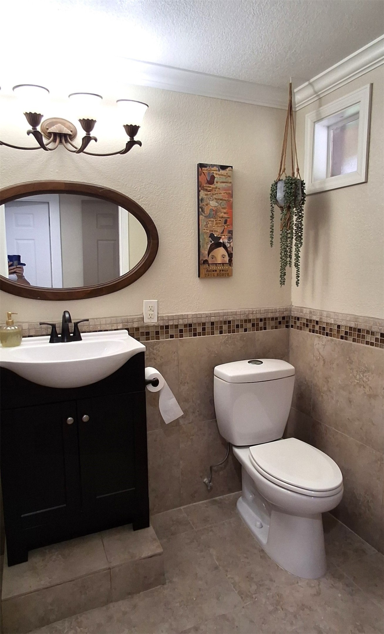 318 Ridgewood Road Goodrich, TX 77335 - Photo 23 of 49 a bathroom with a toilet a sink and mirror