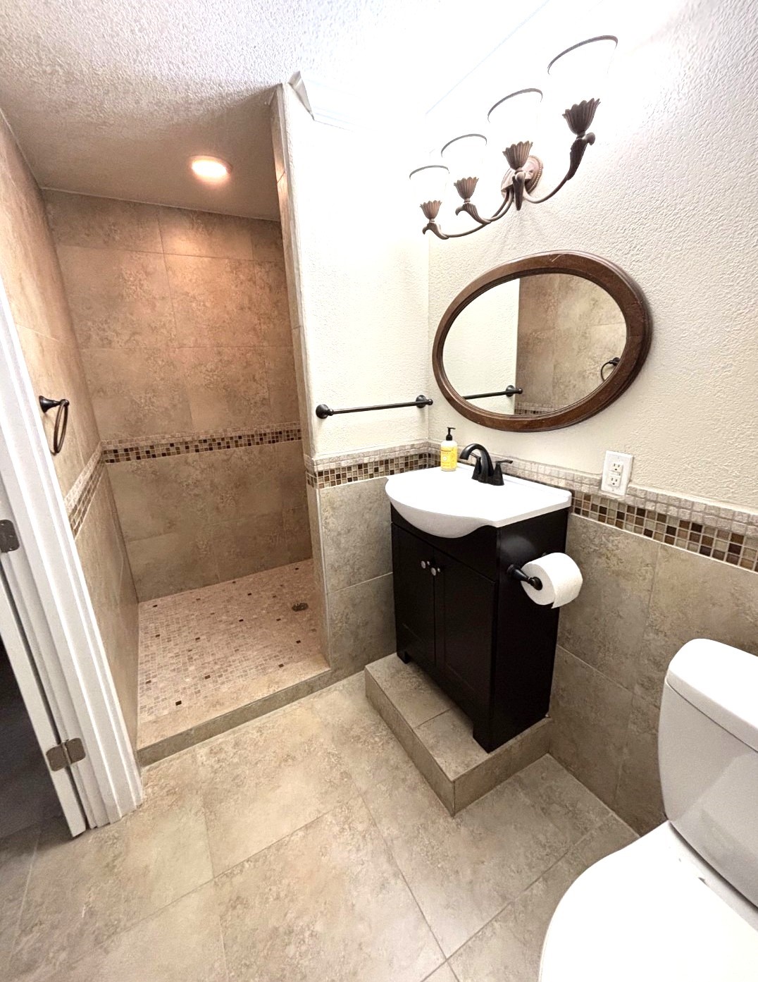 318 Ridgewood Road Goodrich, TX 77335 - Photo 24 of 49 a bathroom with a sink mirror vanity and toilet