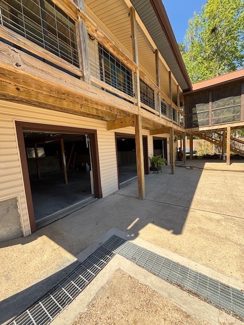 318 Ridgewood Road Goodrich, TX 77335 - Photo 31 of 49 3 car garage with golf cart space and work space!