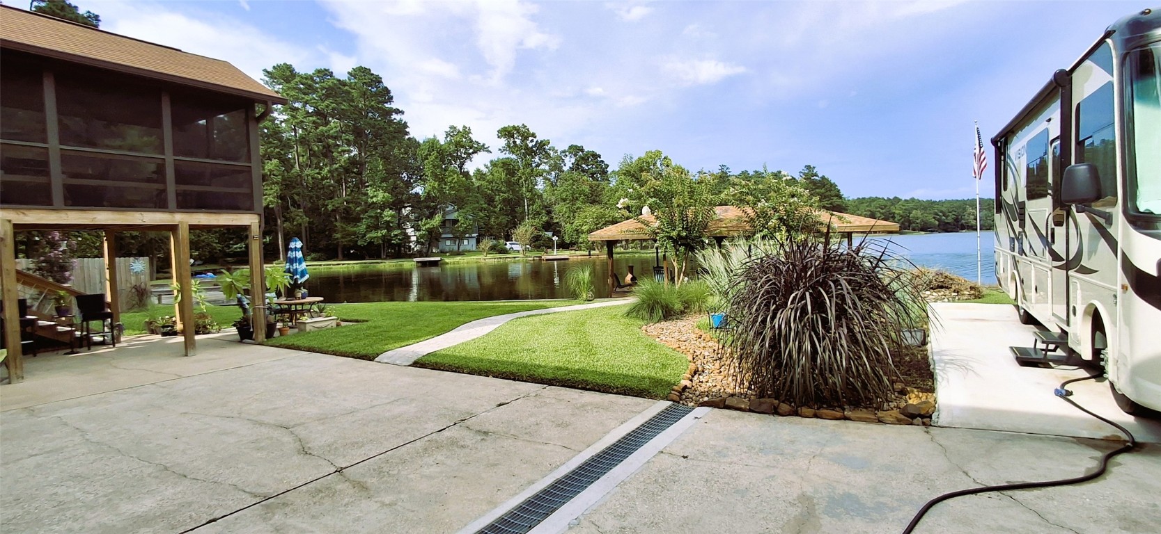 318 Ridgewood Road Goodrich, TX 77335 - Photo 34 of 49 View from porch upstairs. There's even an RV pad and 30amp plug!