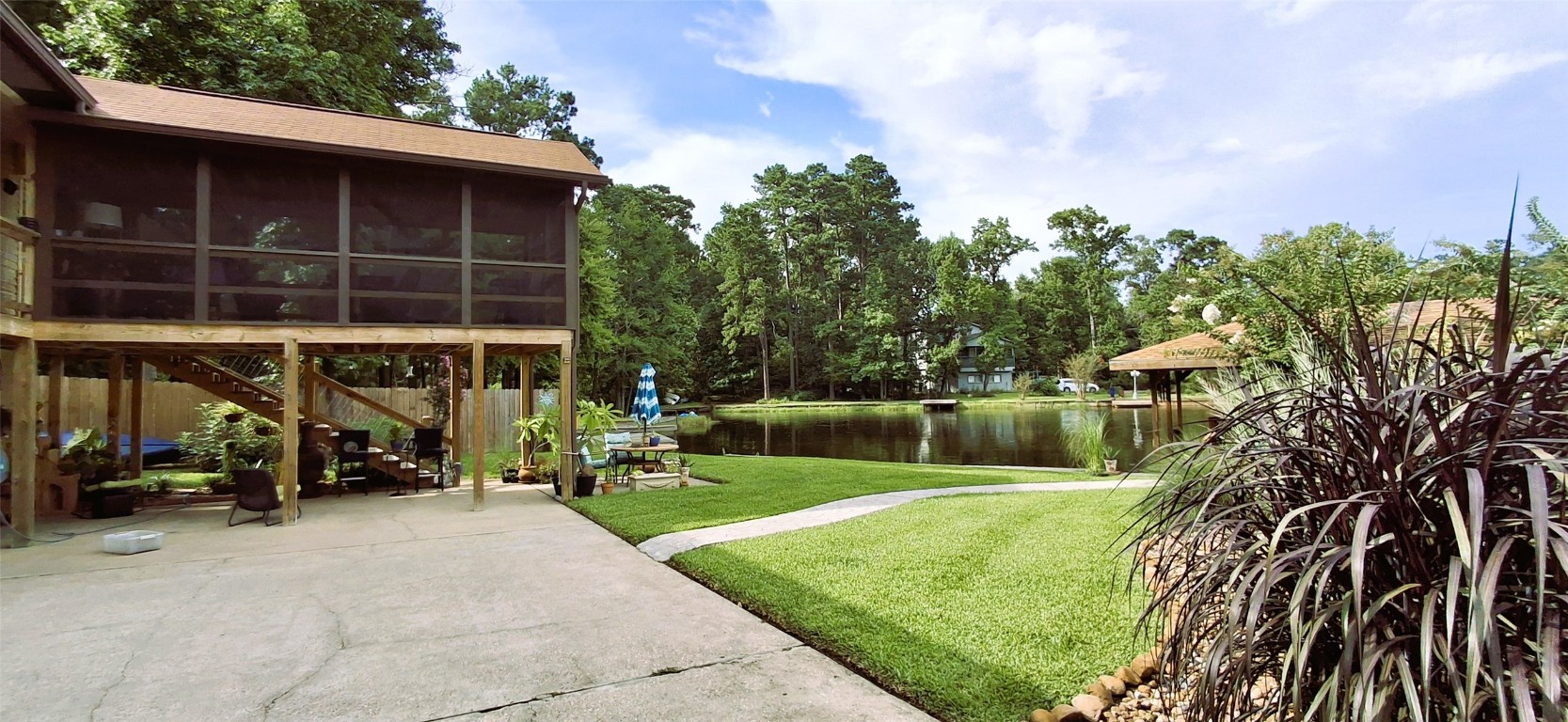 318 Ridgewood Road Goodrich, TX 77335 - Photo 35 of 49 View of lot and covered porch