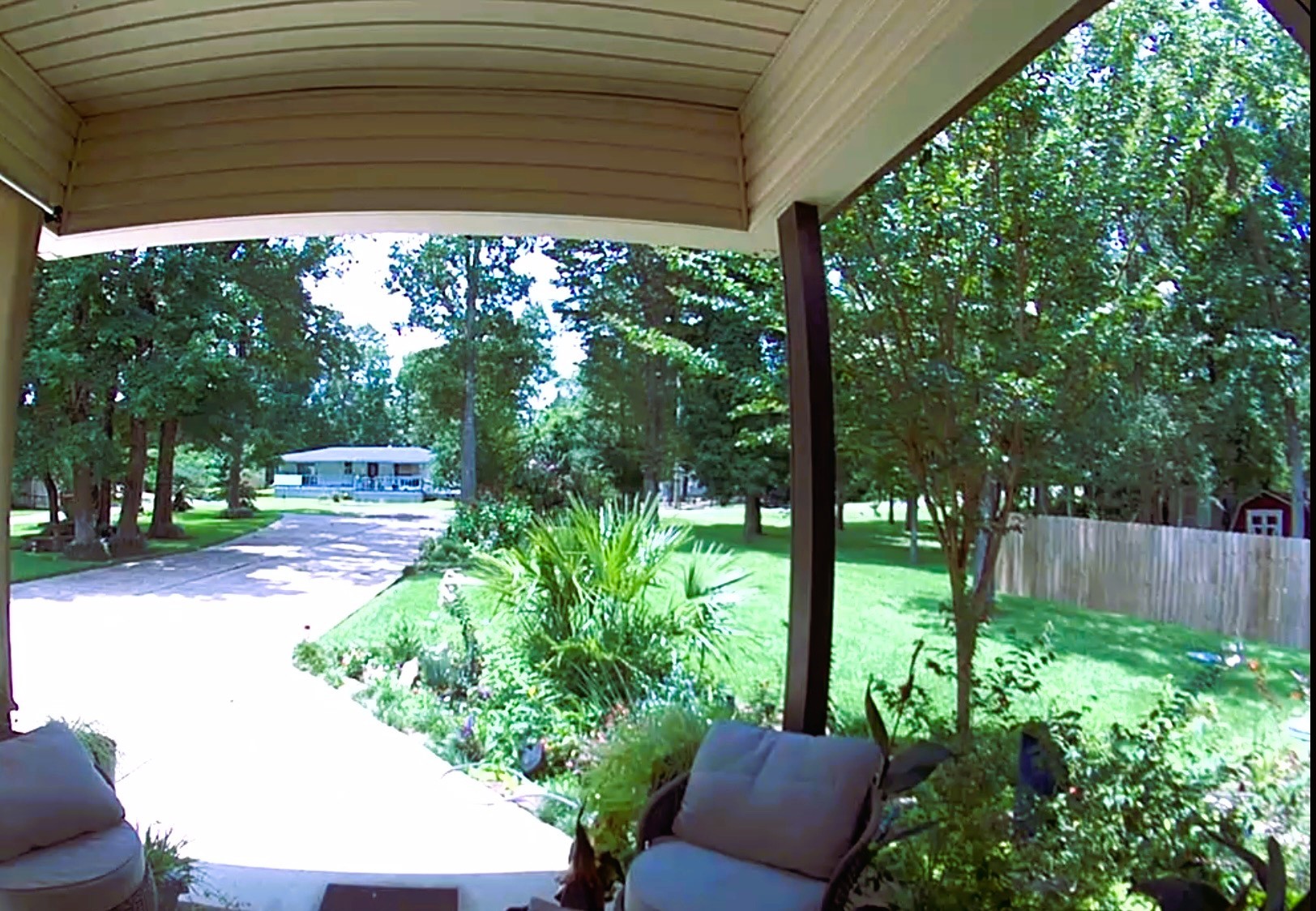 318 Ridgewood Road Goodrich, TX 77335 - Photo 41 of 49 a view of backyard with plants and outdoor seating