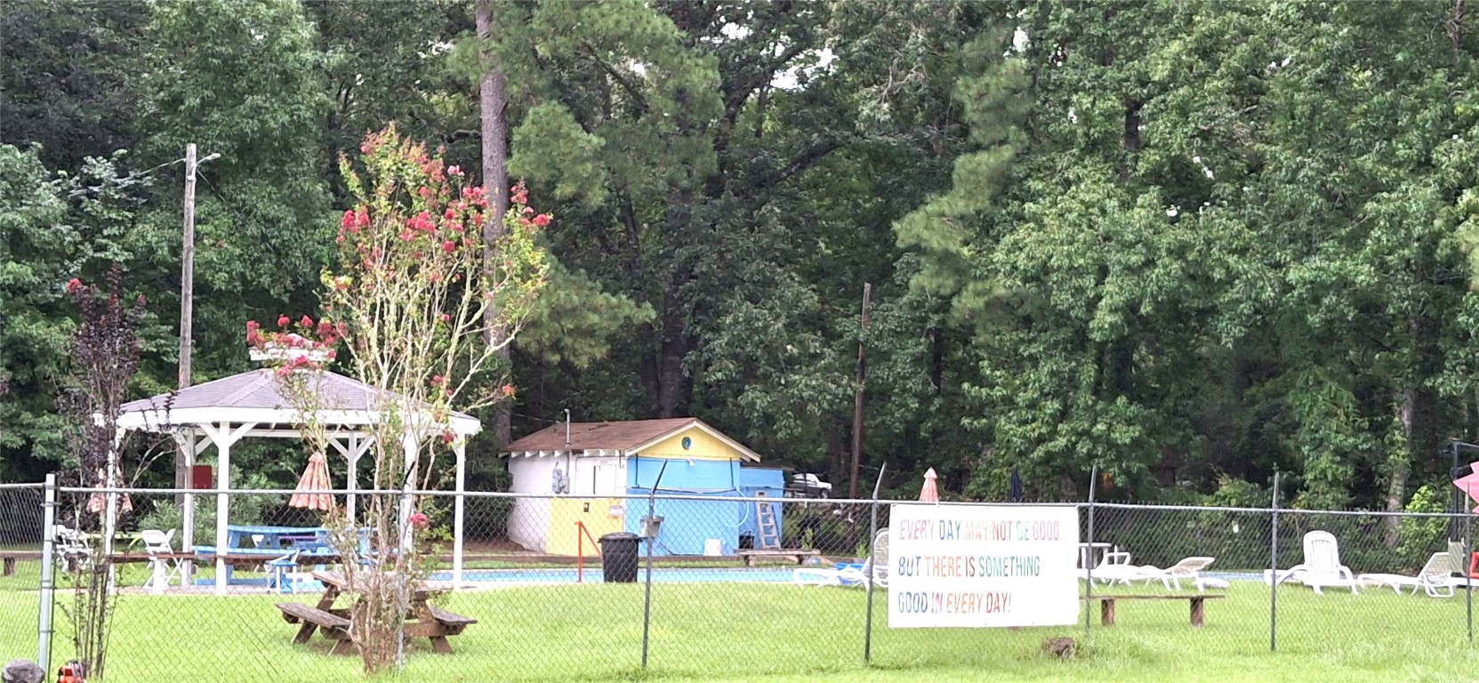 318 Ridgewood Road Goodrich, TX 77335 - Photo 46 of 49 a view of a house with backyard porch and sitting area
