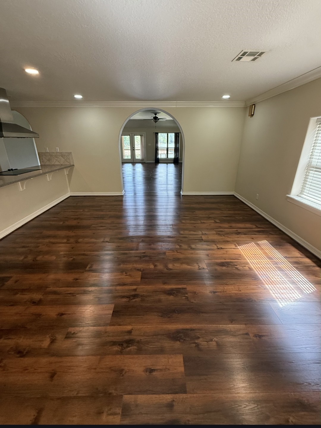 318 Ridgewood Road Goodrich, TX 77335 - Photo 7 of 49 a view of empty room with wooden floor