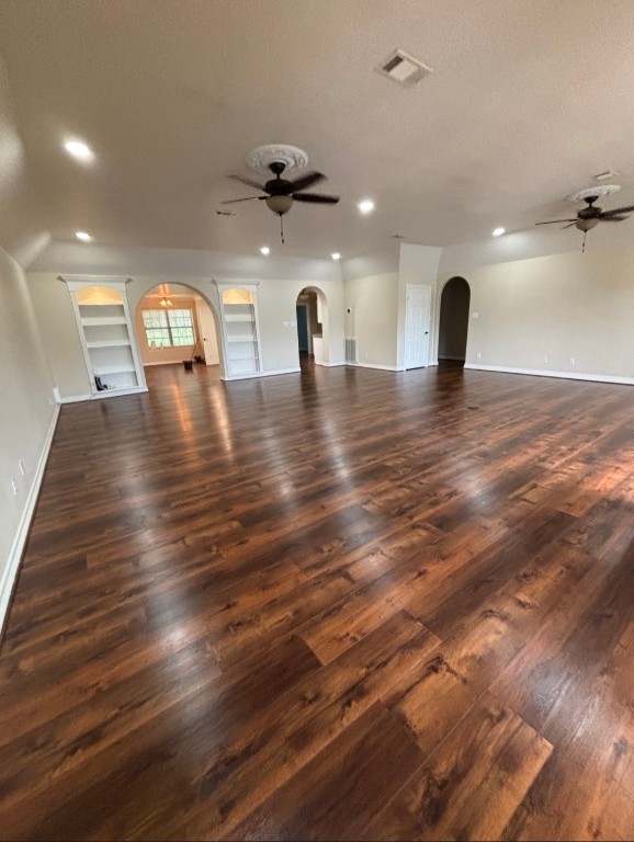 318 Ridgewood Road Goodrich, TX 77335 - Photo 8 of 49 View from other side of living room. Note the beautiful built-ins!
