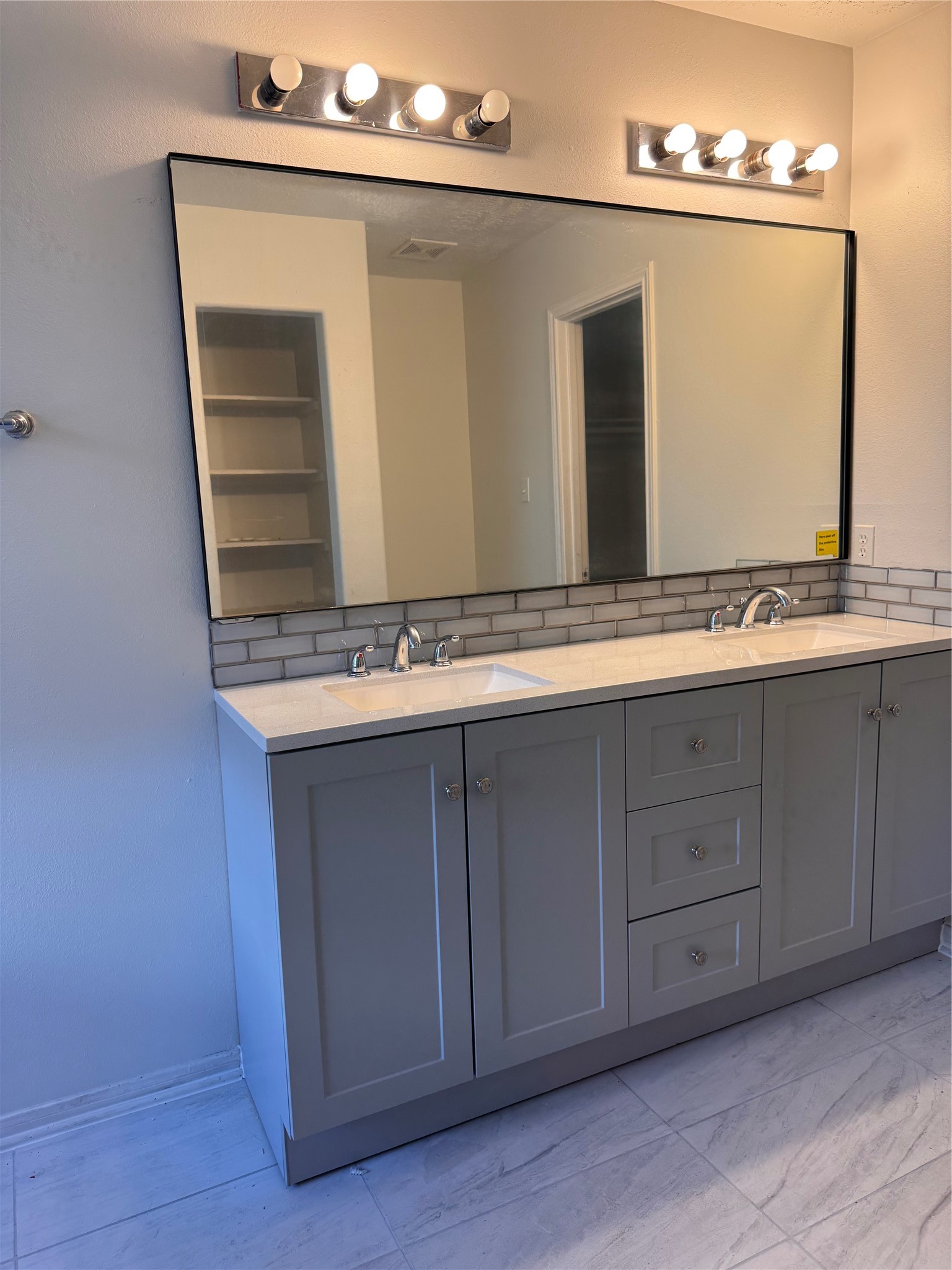 15931 Winston Point Lane Houston, TX 77084 - Photo 12 of 15 a bathroom with a sink vanity and mirror